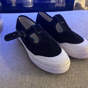 Vans Black and White Slip-On Sneakers